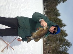 The blog author showing off the biggest fish of the morning