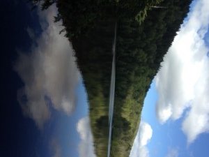 The flank of Pierce Pond Mountain plunges into Dixon Pond