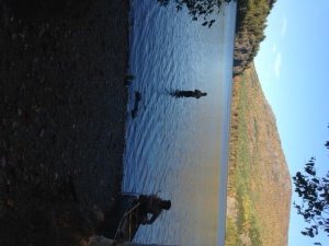 Upper South Branch Pond after the wind died down, with a view of the North Ridge of the Traveler Mountains