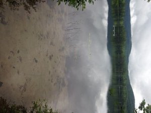 View from the launch of Hutchinson Pond with the mountains in the background