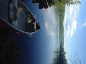 A gorgeous view of Farrington Pond with White Mountain National Forest as a backdrop